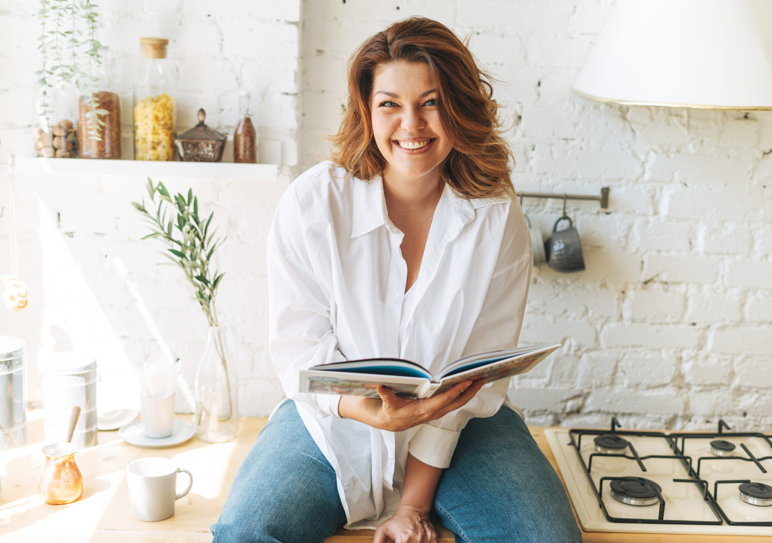 Healthy woman smiling in kitchen smiling