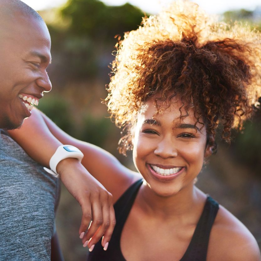 smiling woman with man