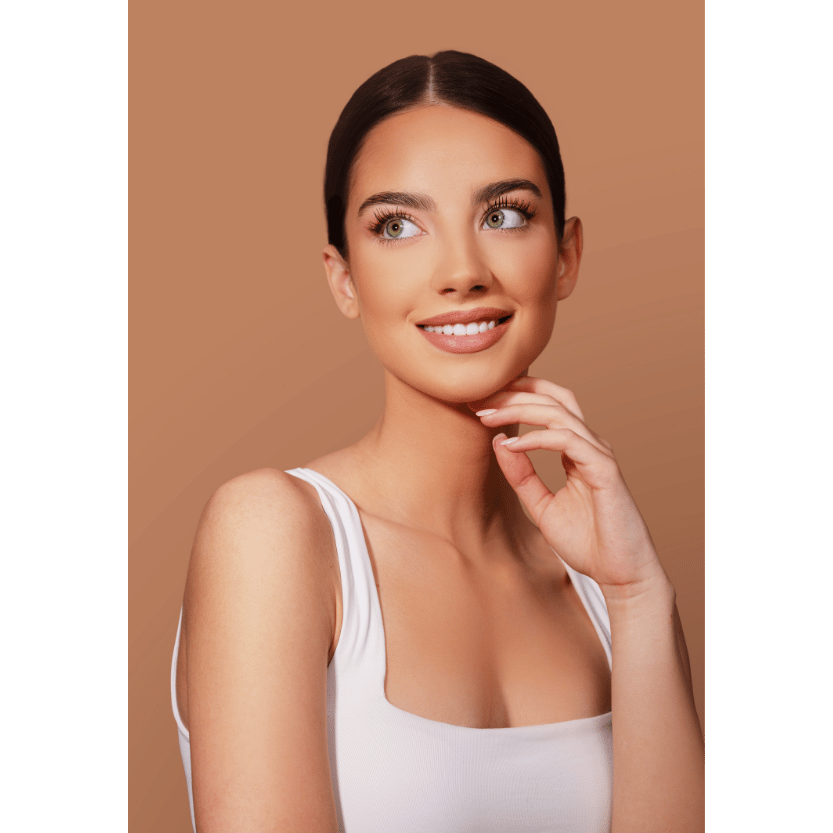 woman with radiant skin on a beige background